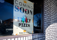 Signage in the window of the former Sliced Pizza location on Riverside Drive Thursday, Jan. 4, 2024, announces Little Italy Pizza coming soon.