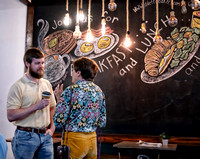 The Times reporter Ben Anderson talks with members of the community Wednesday, Sept. 25, 2024, during a News & Brews event at Diletto Cafe! in downtown Gainesville. The event offers an opportunity for